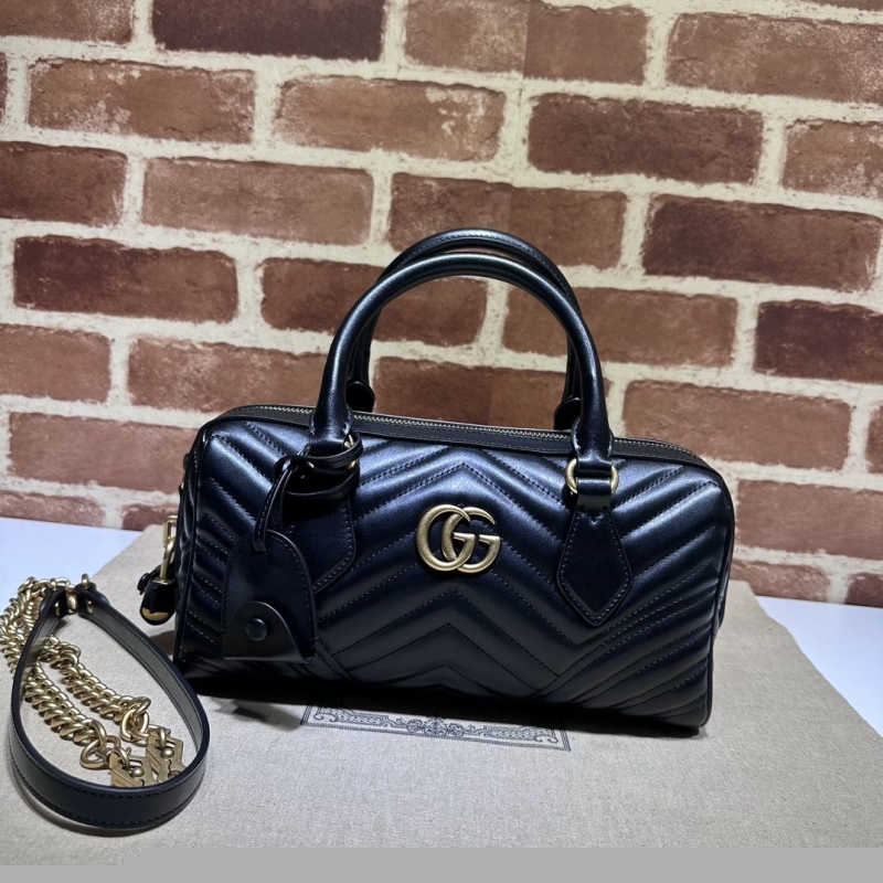 G*u*i top handle bags